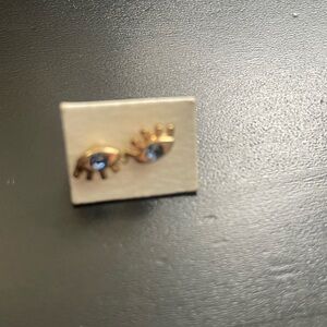 Gold Eye Stud Earrings with Blue Stones
